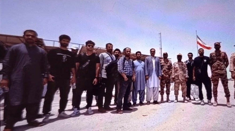 15 crew members of US-seized Iranian ship return home