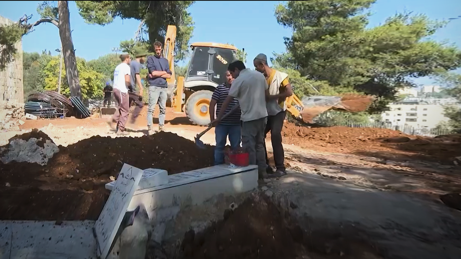 Israeli settlers force residents of West Bank village to exhume body of deceased Palestinian 
