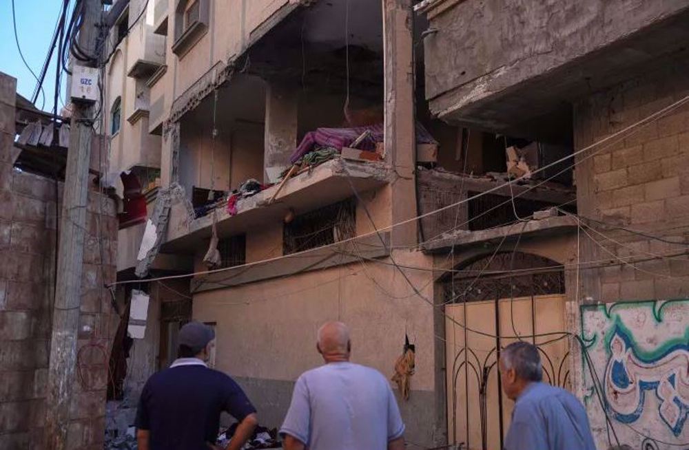 Israeli strike on Gaza home kills father and two young daughters in their sleep