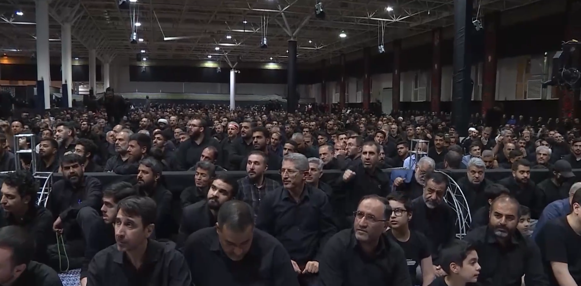 Iranians in Tehran honor Imam Hussein and martyred Leader of Islamic Revolution Ayatollah Khamenei