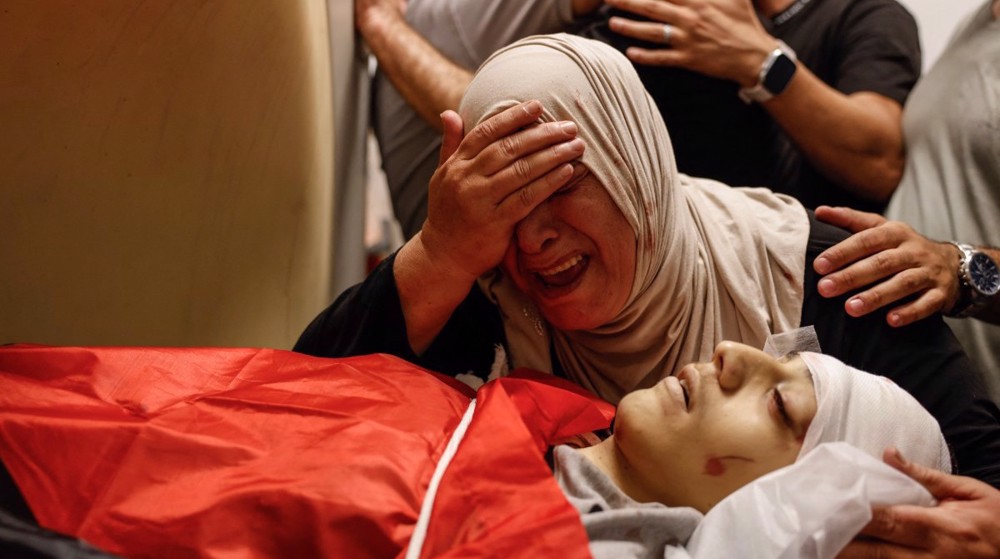 Israeli forces kill Palestinian teen in West Bank, infant dies after emergency passage denied