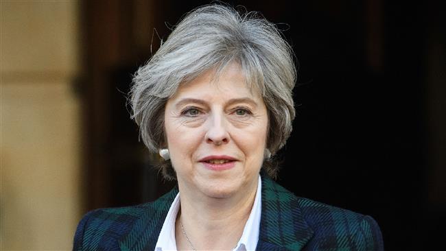 May to emphasize value of NATO to Trump
