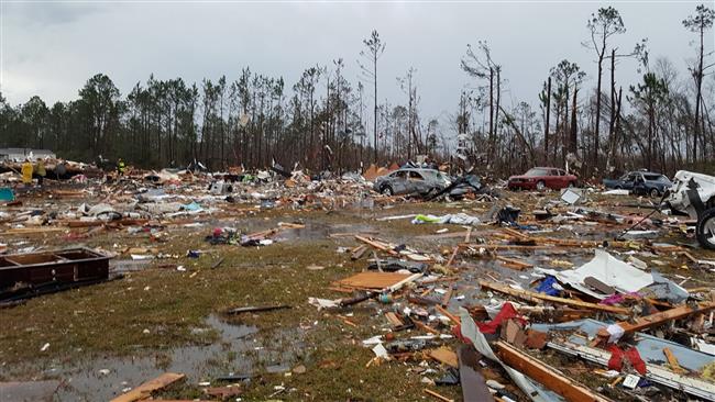 US storms claim 18 lives  