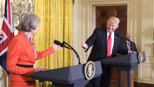 Theresa May urges Trump to sign US-British trade deal