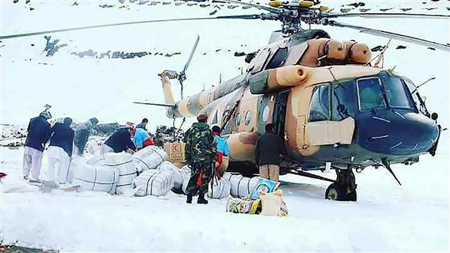 Afghans struggle to save avalanche survivors