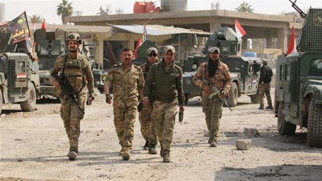 Iraqi forces advance towards Mosul center