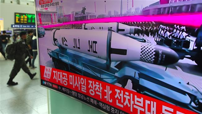 N Korea shows off ballistic missiles at parade