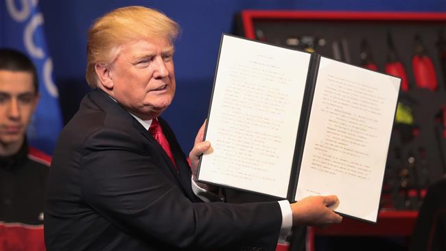 Trump signs order to carry out campaign pledge