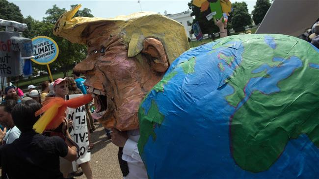 In photos: 1000s out in DC for climate