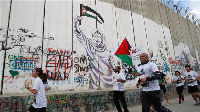 Israel resumes building 'apartheid wall': Report