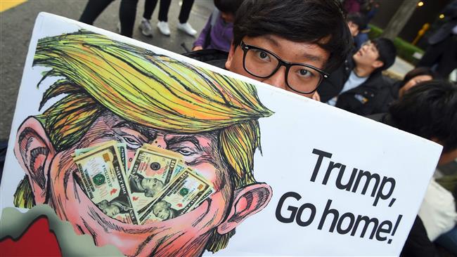 Anti-Trump demo offers preview of South Korea visit