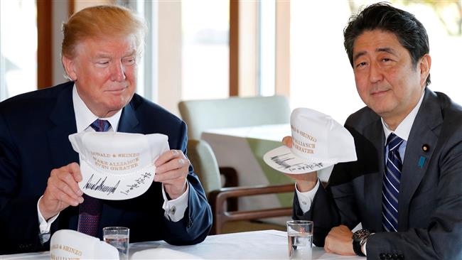 Trump, Abe play golf with golfer Matsuyama