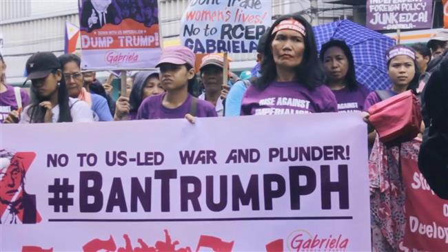 Women protesters rally against Trump in Manila 