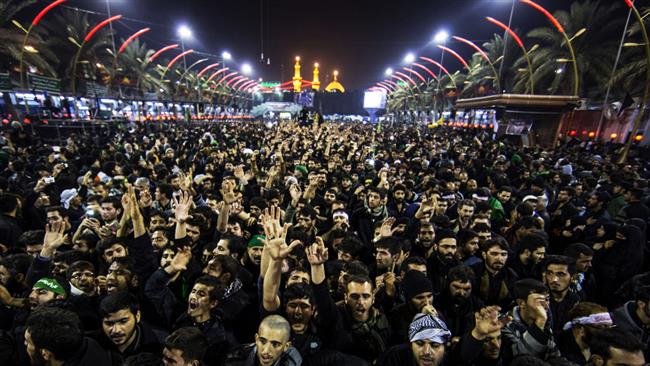 People take part in Arba'een march to Karbala