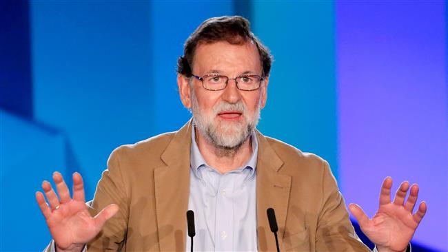 Spain PM urges Catalans to shun separatists