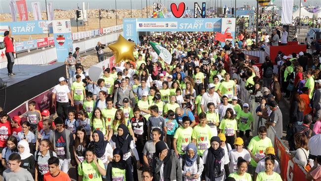 Lebanese call for PM's return at Beirut marathon 