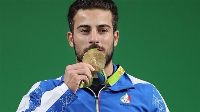 Rostami selling his Olympic gold for quake victims