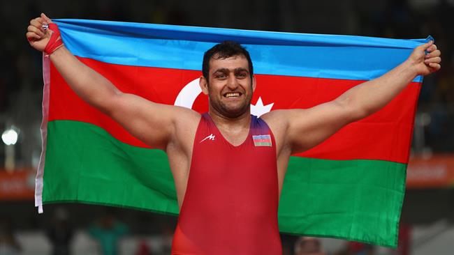 Azeri wrestler selling Olympic medal for Iran quake victims