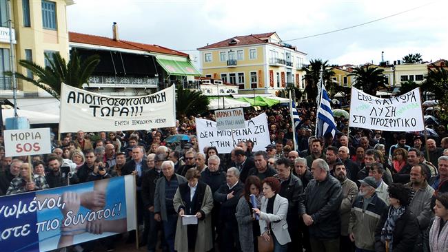 Greek islanders protest detention of refugees on Lesbos