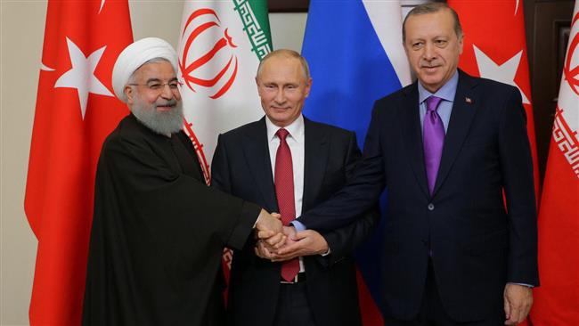 Iran, Russia, Turkey presidents hold Syria talks