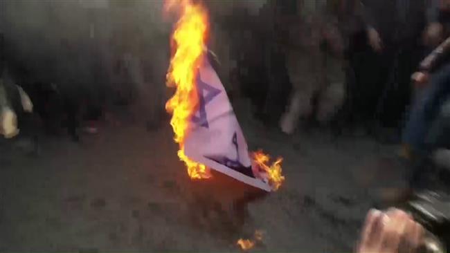Protesters in Indian-controlled Kashmir burn US, Israeli flags 