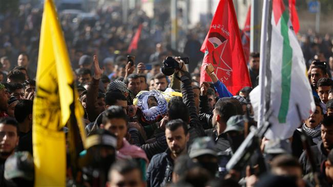 Palestinians killed by Israeli bombs, bullets laid to rest