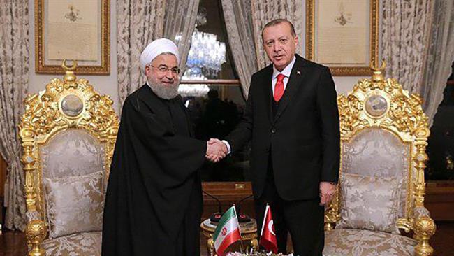 Iran's President Rouhani meets Erdogan in Turkey 