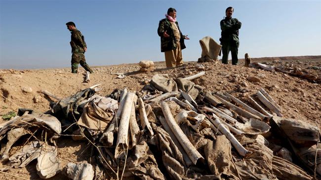 Iraqi forces unearth two Izadi mass graves in Sinjar