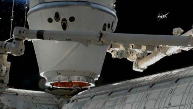 SpaceX resupply cargo craft installed at ISS