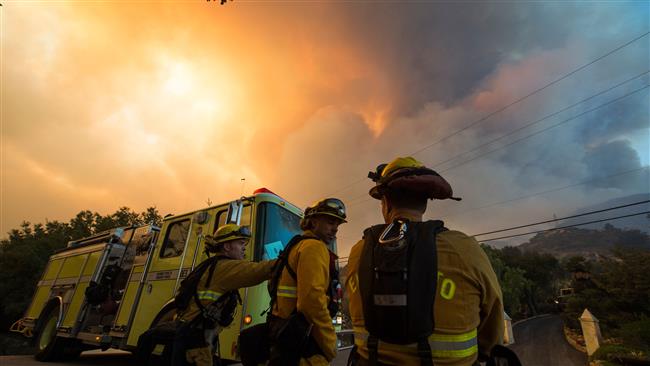 1000s flee as wildfire grows to California's 3rd-largest