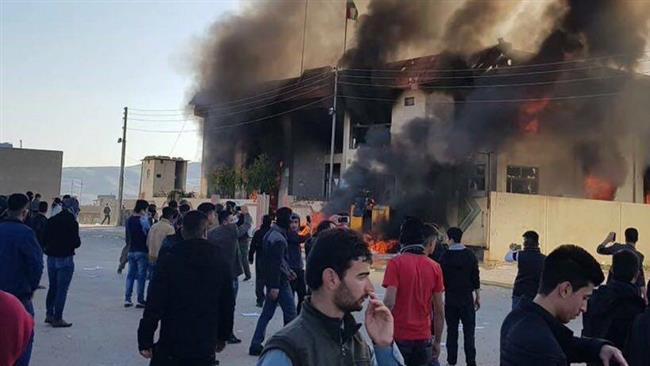 Protesters torch party offices in Iraq's Kurdistan