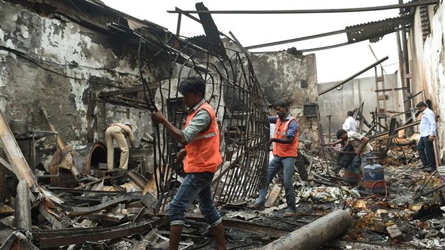 Fire kills 12 snack shop workers in India