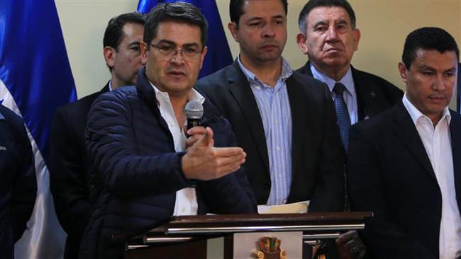 Honduras president re-elected, opposition cries foul