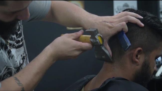 Syrian refugee barber gives hair the axe in Brazil