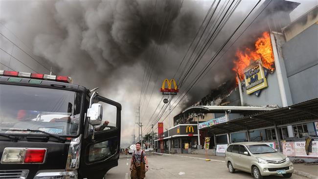 Nearly 40 bodies found in Philippines mall fire 