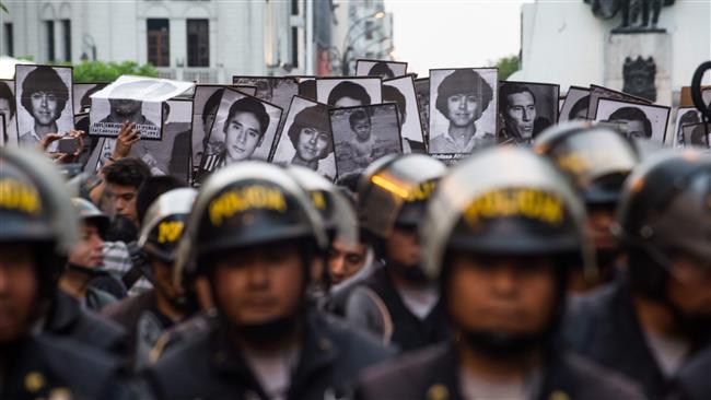 1000s protest Fujimori’s pardon in Peruvian capital