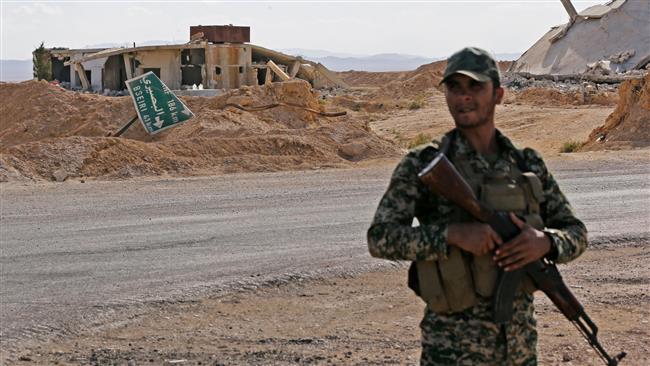 Syrian army battles militants at strategic base in Harasta
