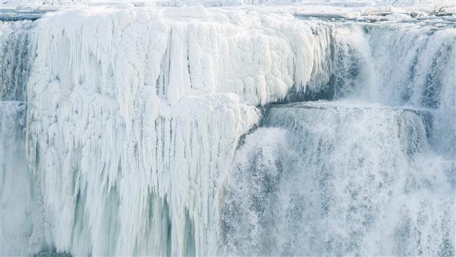 Niagara Falls partially frozen over in N. American cold snap