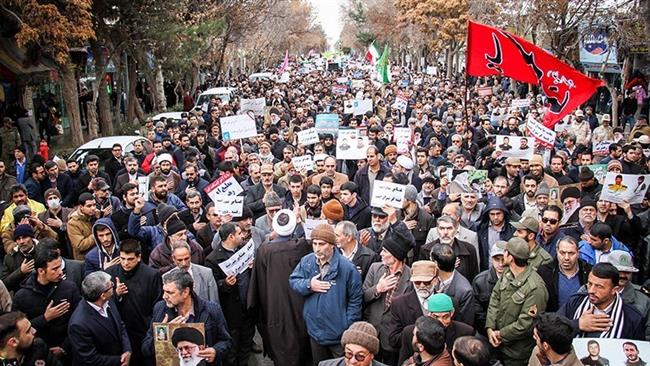 Iranians rally to condemn violence, back establishment