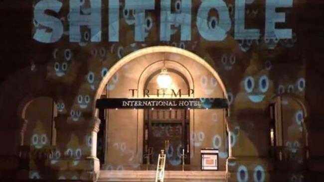 'Shithole' projected on Trump Hotel in DC