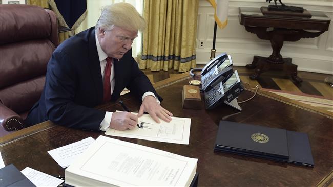 Trump signs spying extension bill into law