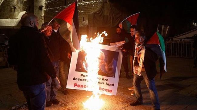 Palestinians burn Pence's photos, say visit 'desecrating'  