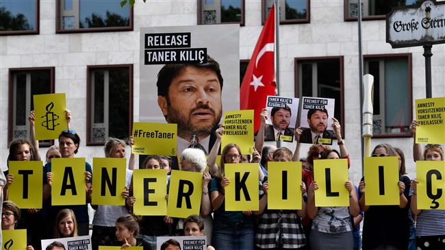 Turkish court reverses release of Amnesty head