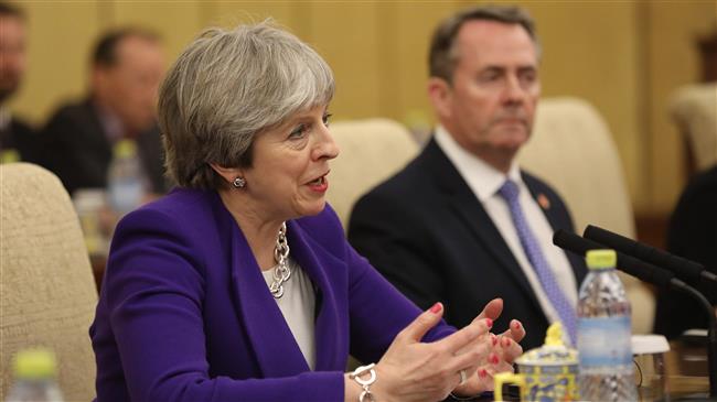 Defiant British PM rejects criticism of Brexit plan