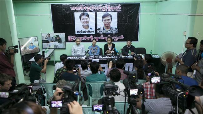 Reuters says journalists arrested by Myanmar over massacre story