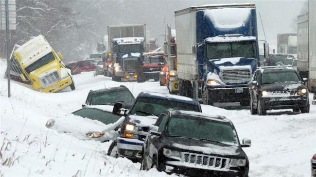 Two dead as winter storm pounds US Midwest 