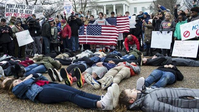 US students stage ‘lie-in’ protest to demand gun reform 