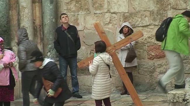 Pilgrims pray outside closed doors of Sepulchre Church