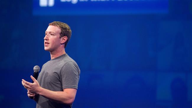 Zuckerberg apologizes as Facebook scandal grows