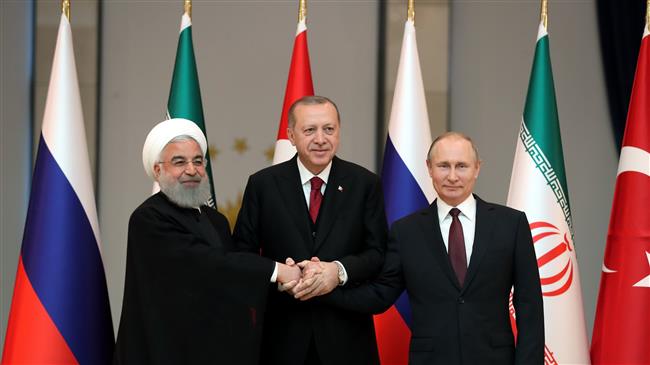 Iran, Russia, Turkey vow to work toward Syria peace